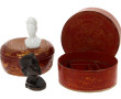 Un coffret rond décor laqué dans les ton