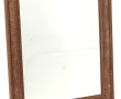 Miroir à encadrement en bois sculpté, 51