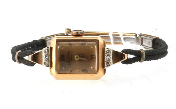 Montre braclet de dame, boîtier en or ja