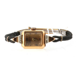 Montre braclet de dame, boîtier en or ja
