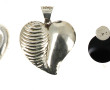 Lot de 4 pendentifs en argent dont 3 en 