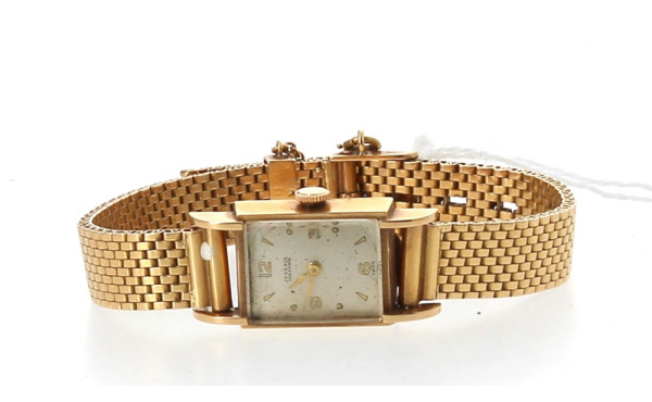 Montre bracelet de dame en or jaune 18 c