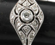 Bague vers 1920 en or gris et platine se