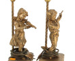 Paire de lampes en métal redoré figurant