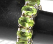Bague en argent et 5 péridots ovales, po