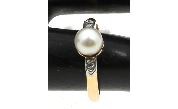 Bague en or jaune 18 carats, poinçon têt