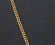 Chaîne en or jaune 18 cts, poinçon tête 
