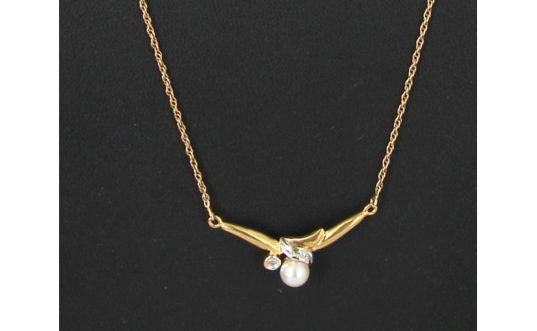 Collier en or jaune 18 cts, poinçon tête