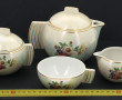 Service égoïste en porcelaine nacré et o