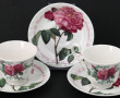 7 tasses et 7 sous-tasses en porcelaine 