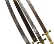 Un sabre briquet et 2 glaives, époque mi