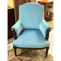 Fauteuil de style Louis XVI recouvert d'