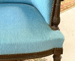Fauteuil de style Louis XVI recouvert d'