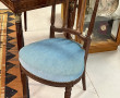 Fauteuil de style Louis XVI recouvert d'