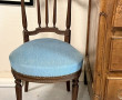Fauteuil de style Louis XVI recouvert d'