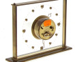 Pendule JAZ en laiton, H 15,5 x L 20 cm 