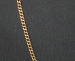 Chaîne en or jaune 18 cts, poinçon tête 