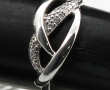 Bague en or gris 375ème (9 cts) et petit