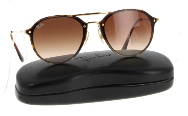 RAY-BAN - Paire de solaire femme, étui d