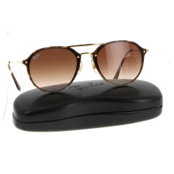 RAY-BAN - Paire de solaire femme, étui d