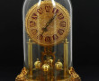 LANCEL Paris - Pendule sous globe, bronz