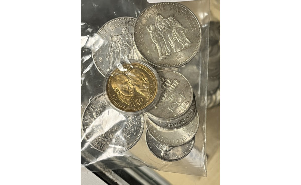 Lot comprenant 2 pièces de 50 F argent, 