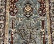 Tapis rectangulaire dans les tons bleus,