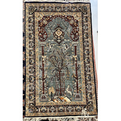 Tapis rectangulaire dans les tons bleus,
