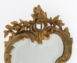 Petit miroir en bronze doré de style roc