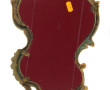 Petit miroir en bronze doré de style roc