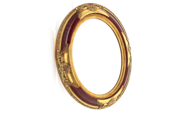 Miroir ovale à encadrement doré style ro