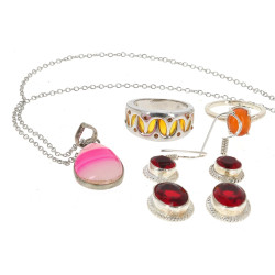 Lot de 4 bijoux montés argent : paire de