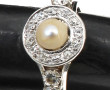 Bague en or gris 18 carats, poinçon tête