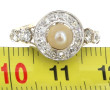 Bague en or gris 18 carats, poinçon tête