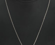 Pendentif en or gris 18 cts serti de 3 p
