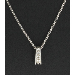 Pendentif en or gris 18 cts serti de 3 p