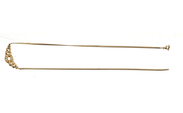 Collier accidenté en or jaune 9 cts et s