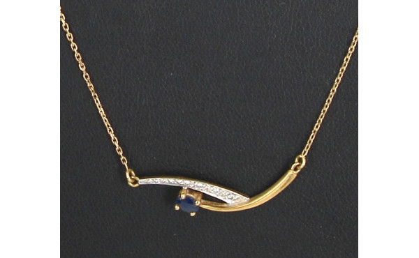 Collier en or jaune 18 cts (750è) serti 