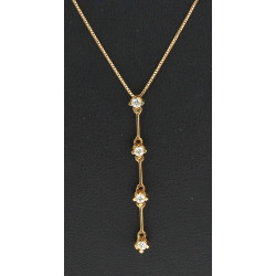 Collier en or jaune 18 cts (750è) serti 
