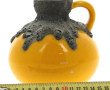Vase boule à anse en céramique jaune et 