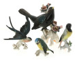 Trois sujets en porcelaine oiseaux et hi