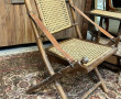 Fauteuil pliant en cannage et lanières d