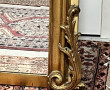 Important trumeau en bois et stuc doré, 
