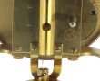 Pendulette en médal doré et balancier ro