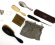 Lot comprenant 4 brosses dont une en arg