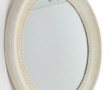 Miroir ovale entourage blanc à décor d'u