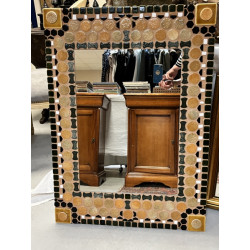 Miroir en céramique dans les tons verts 