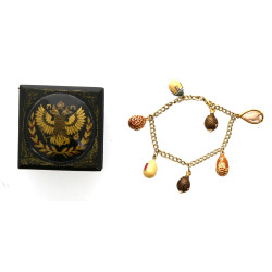Bracelet en plaqué or agrémenté d'un pou