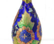 Vase en verre bleu à décor émaillé de fl