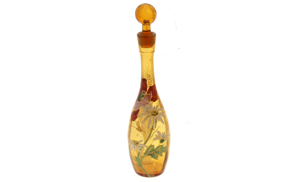 Carafe circa 1900 en verre ambre à décor